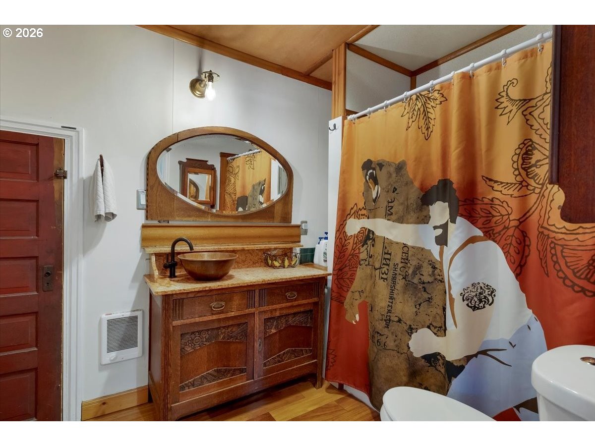 162 Riverside Drive Idanha, OR 97350 - Photo 11 of 37 a bathroom with a sink a mirror and a toilet