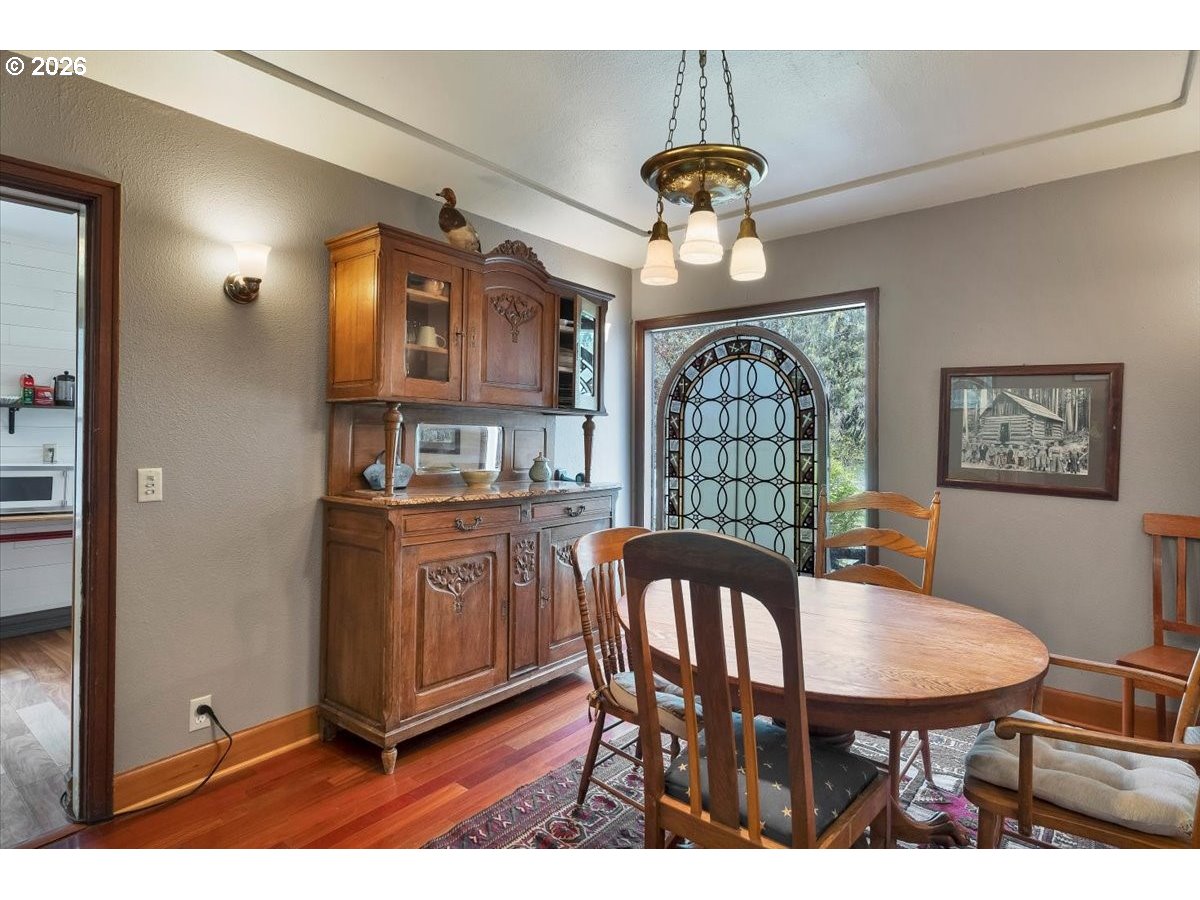 162 Riverside Drive Idanha, OR 97350 - Photo 12 of 37 a dining room with furniture a chandelier and window