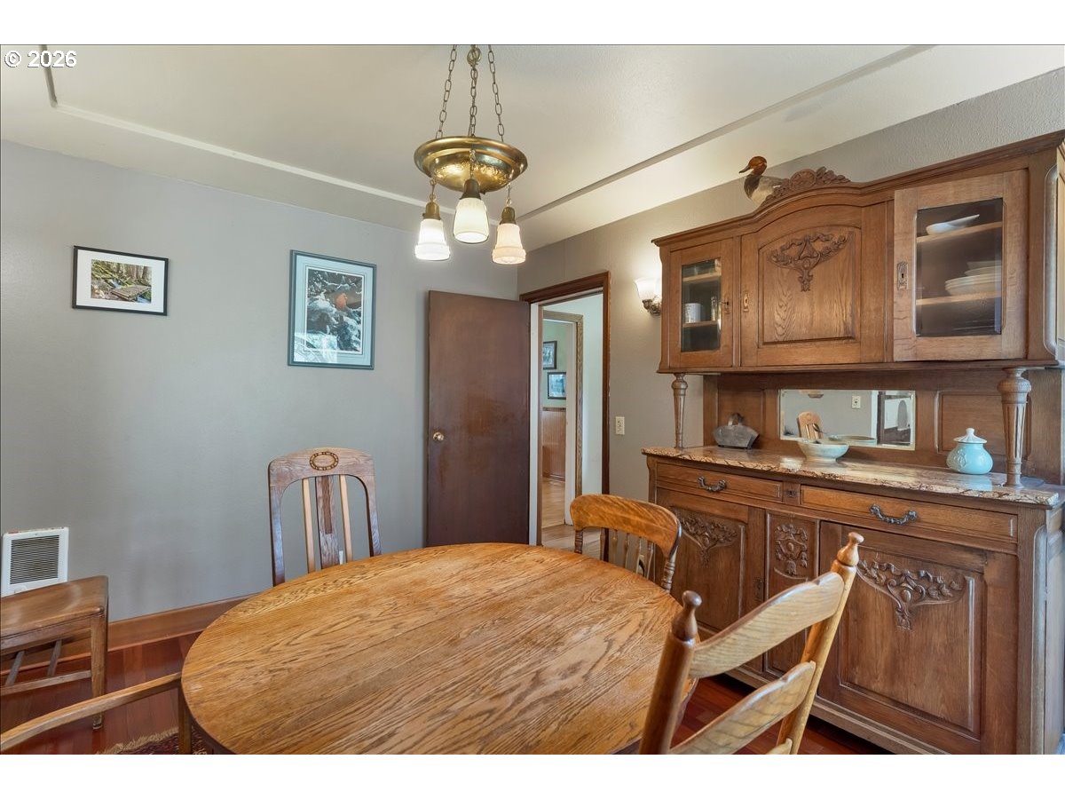 162 Riverside Drive Idanha, OR 97350 - Photo 14 of 37 a bedroom with a bed and a chandelier