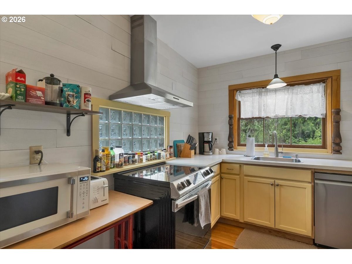 162 Riverside Drive Idanha, OR 97350 - Photo 16 of 37 a kitchen with a sink stove and cabinets