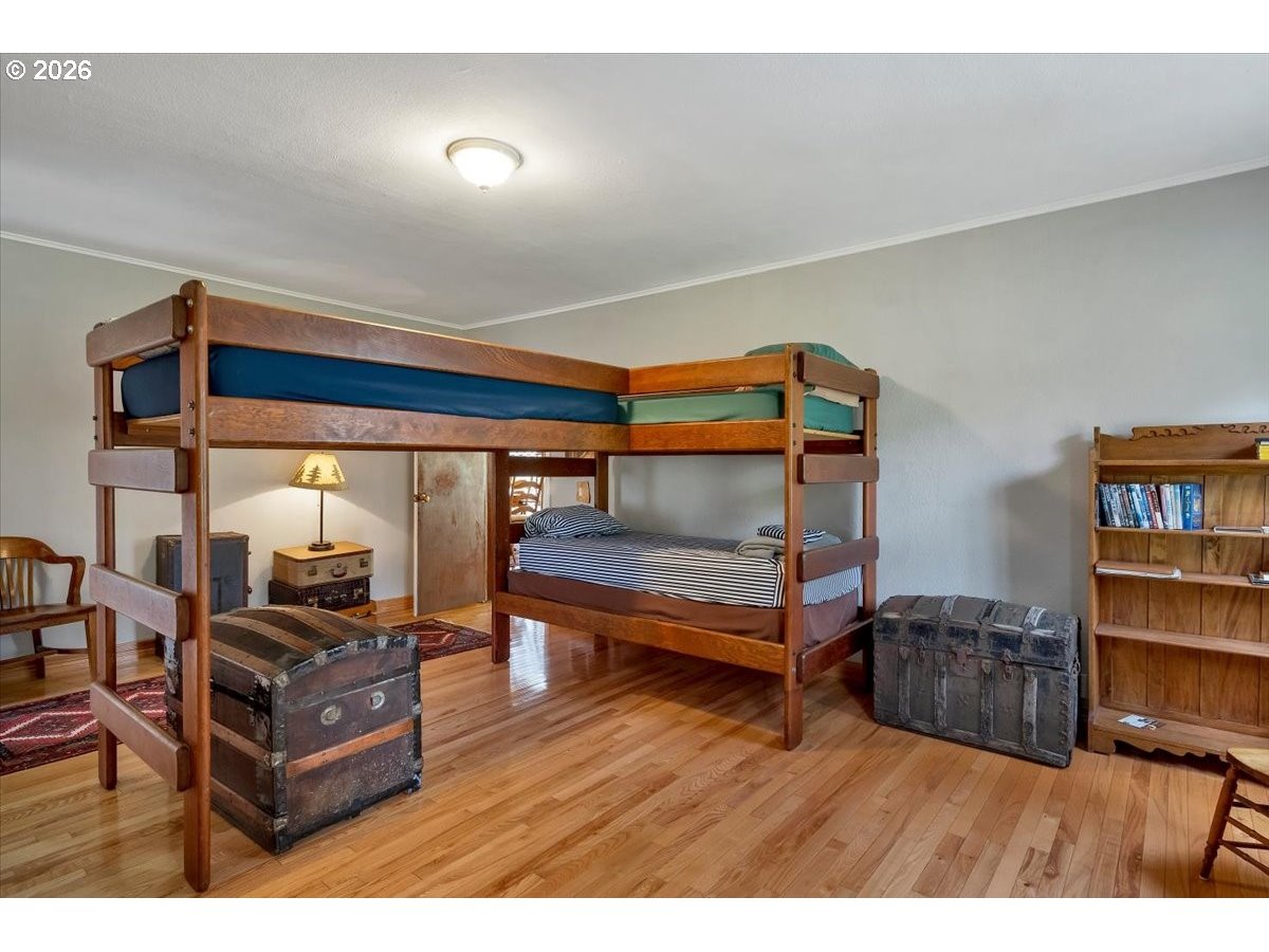 162 Riverside Drive Idanha, OR 97350 - Photo 20 of 37 a bedroom with furniture and a book shelf
