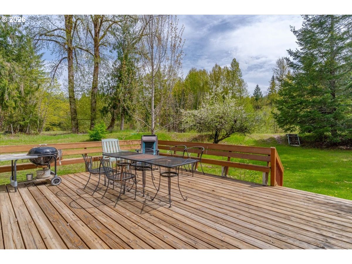 162 Riverside Drive Idanha, OR 97350 - Photo 32 of 37 a view of a bench sitting on a wooden floor