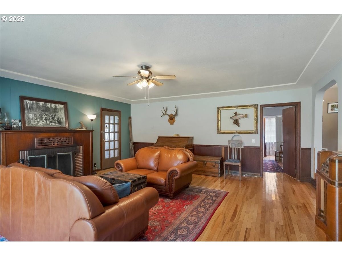 162 Riverside Drive Idanha, OR 97350 - Photo 5 of 37 a living room with furniture and a chandelier