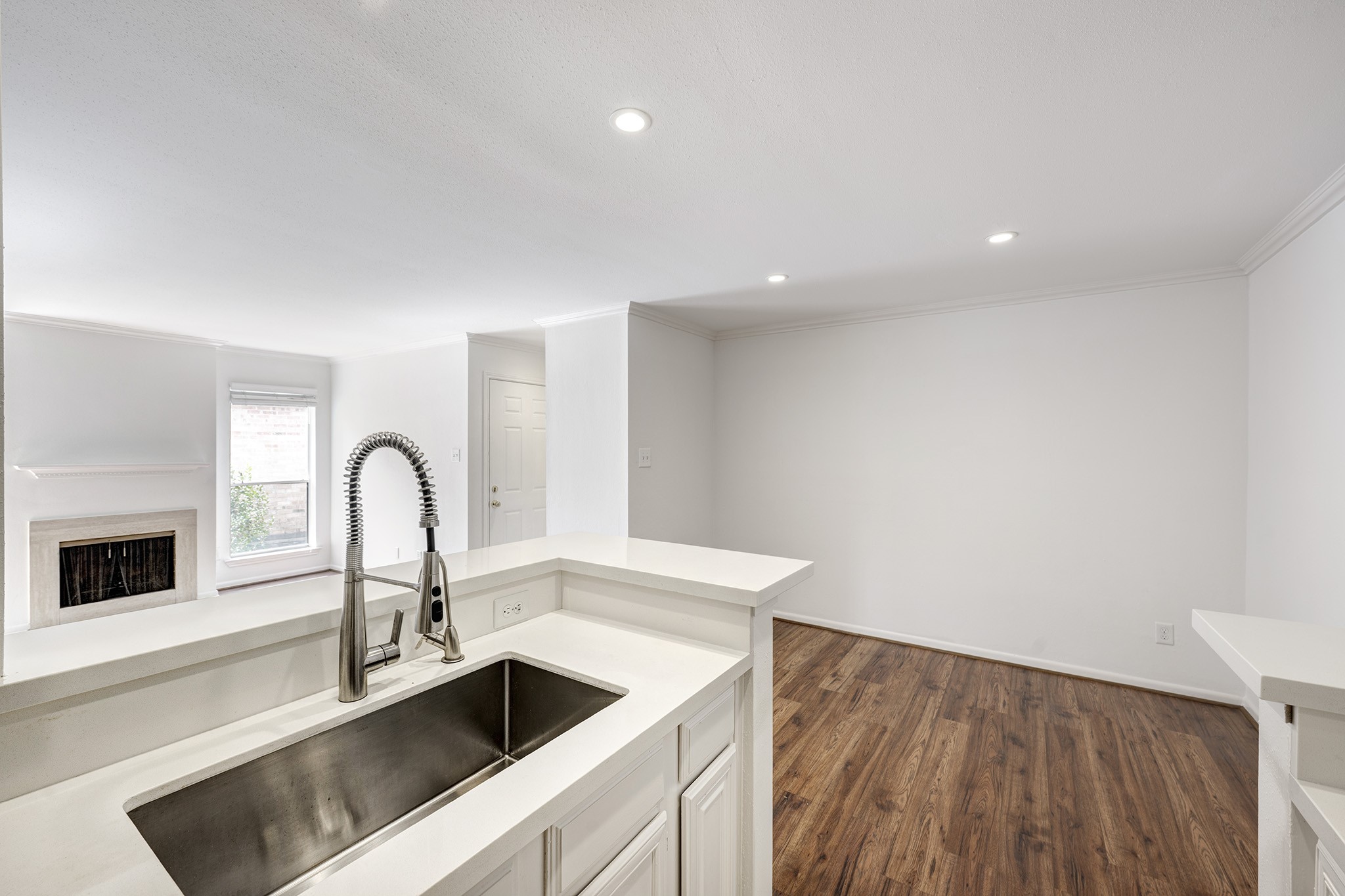 1601 South Shepherd Drive, Unit 224 Houston, TX 77019 - Photo 7 of 14 a kitchen with a sink cabinets and appliances