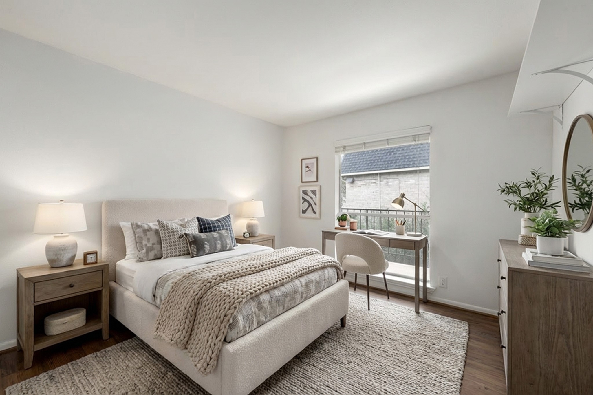1601 South Shepherd Drive, Unit 224 Houston, TX 77019 - Photo 10 of 14 a bedroom with a bed and a potted plant