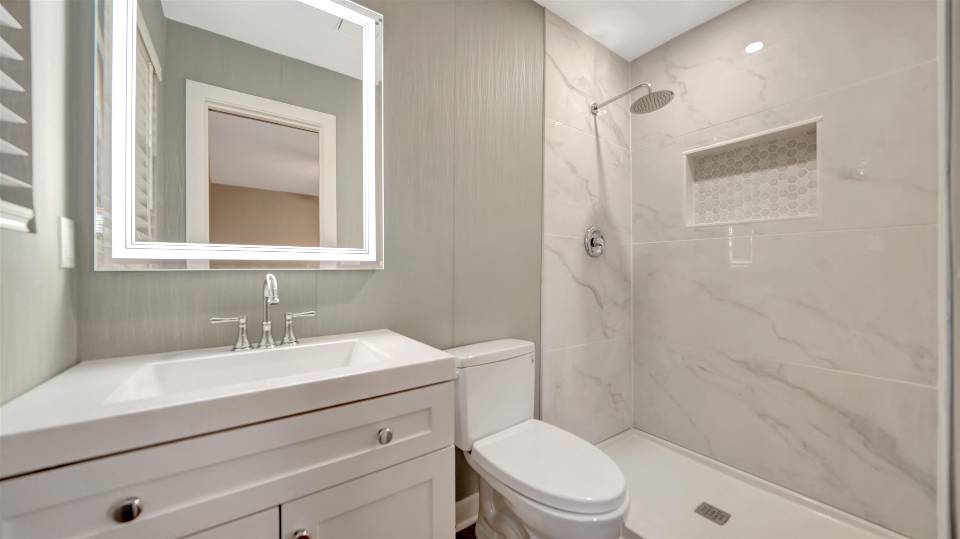 114 Cardinal Road St. Augustine, FL 32086 - Photo 14 of 30 a bathroom with a sink a toilet and shower
