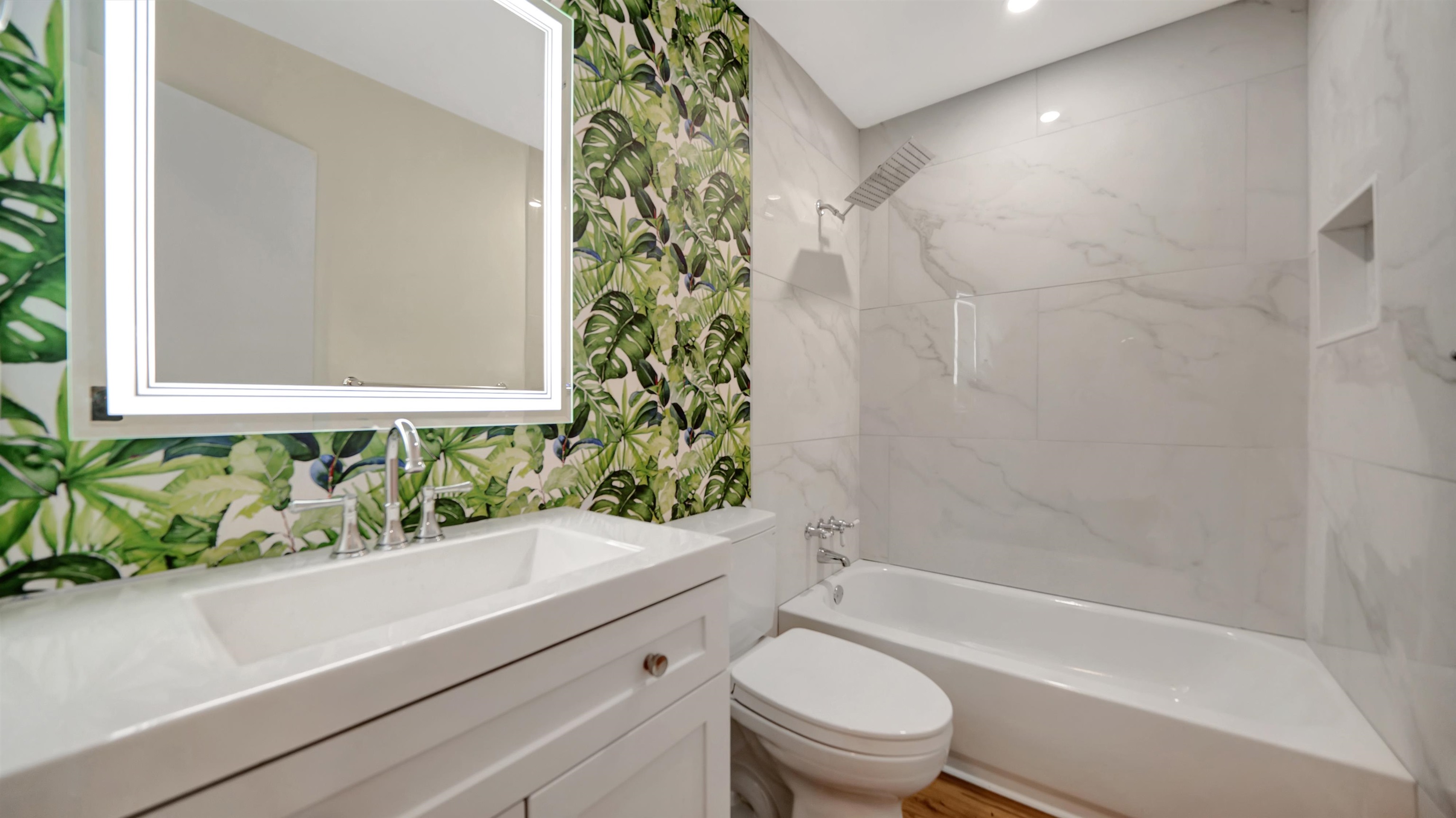 114 Cardinal Road St. Augustine, FL 32086 - Photo 4 of 30 a bathroom with a sink a toilet a window and a bathtub