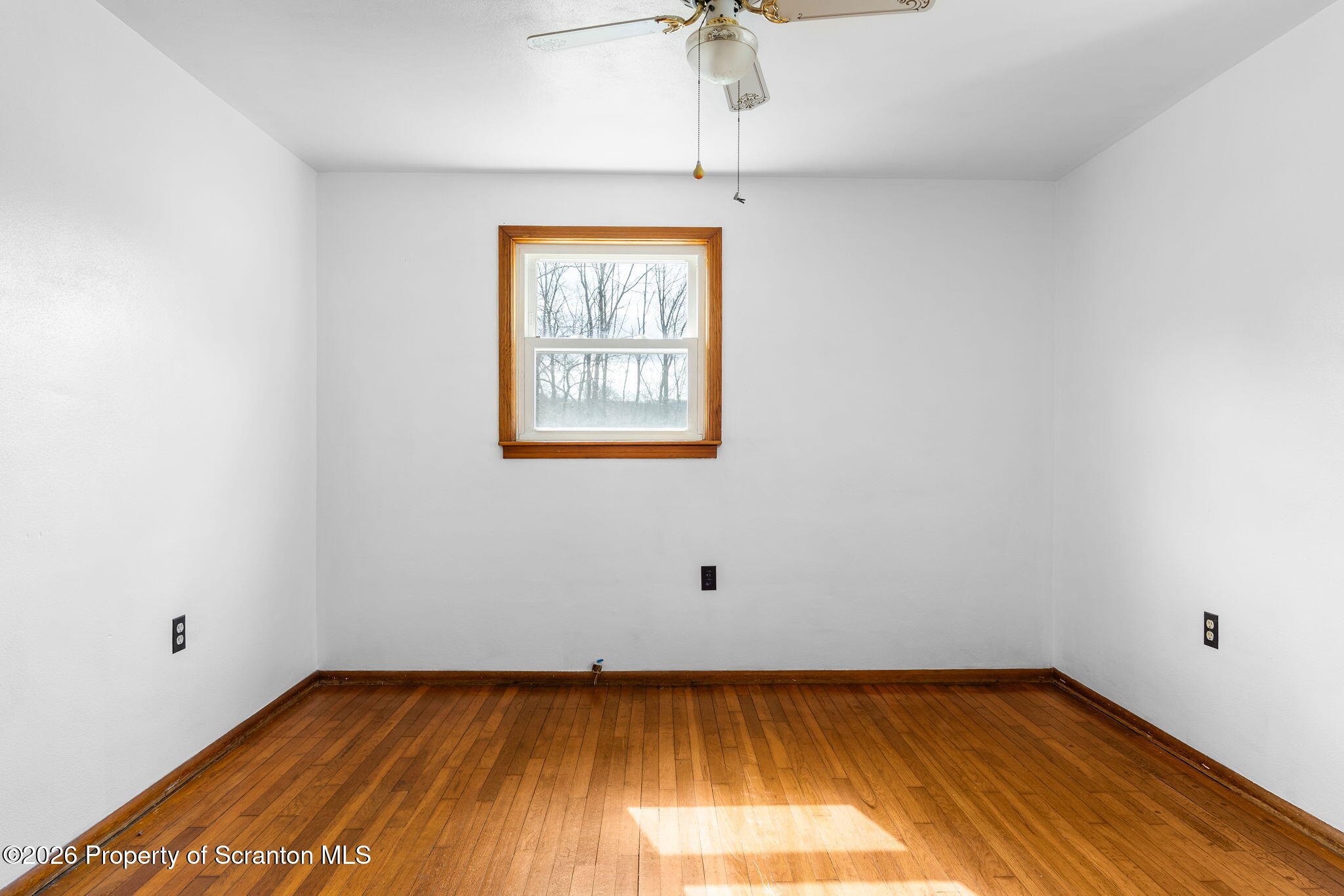 139 N Road Windsor, NY 13865 - Photo 16 of 44 a view of room with window and hardwood floor