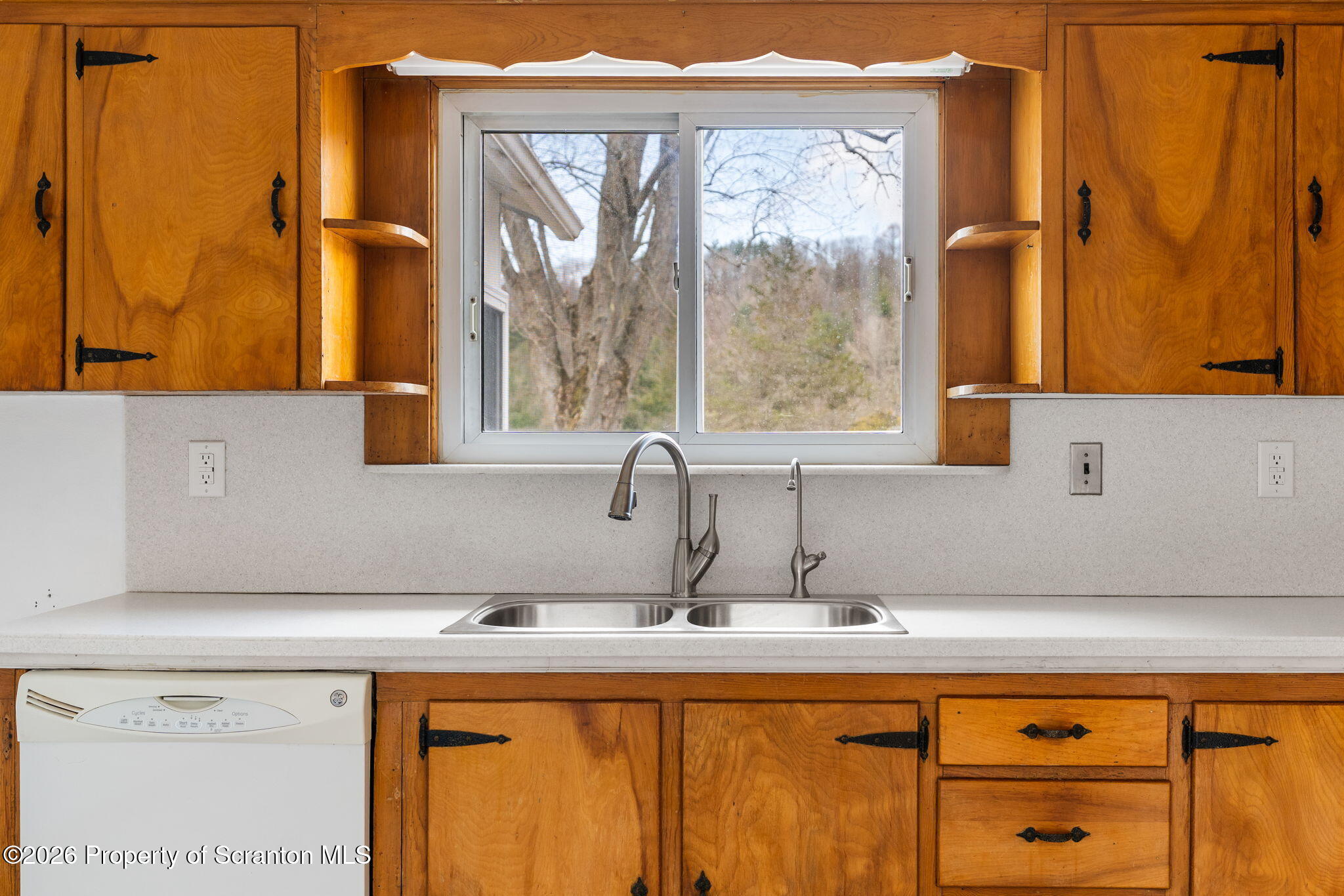 139 N Road Windsor, NY 13865 - Photo 20 of 44 a bathroom with a sink and a large mirror
