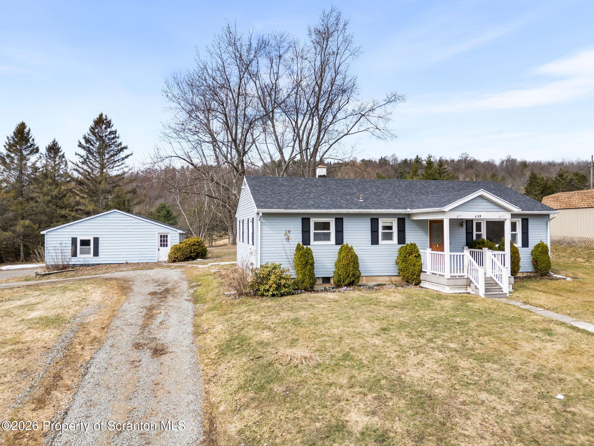 139 N Road Windsor, NY 13865 - Photo 2 of 44 a front view of a house with a yard