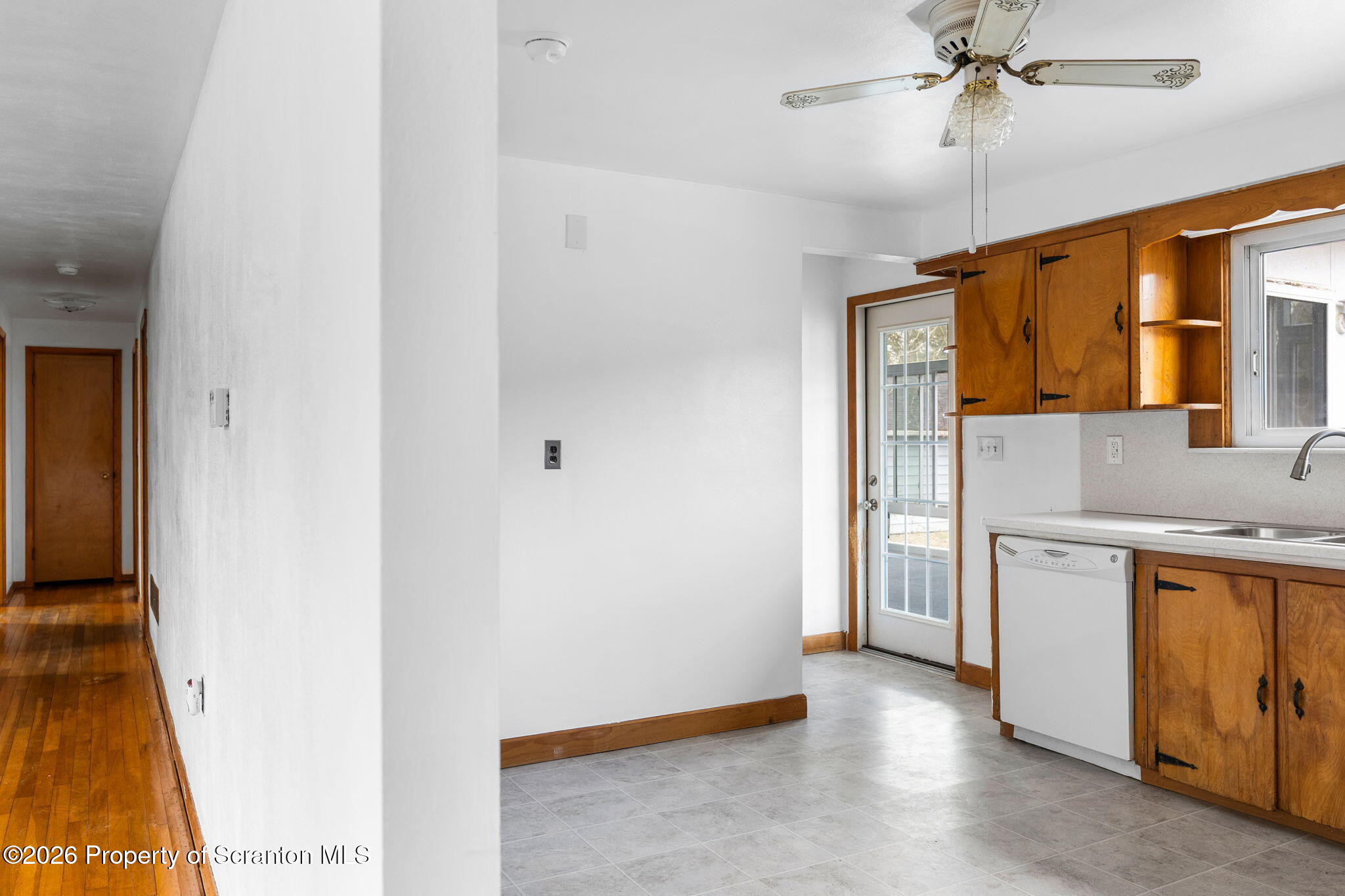 139 N Road Windsor, NY 13865 - Photo 21 of 44 a view of a kitchen with a sink and cabinets