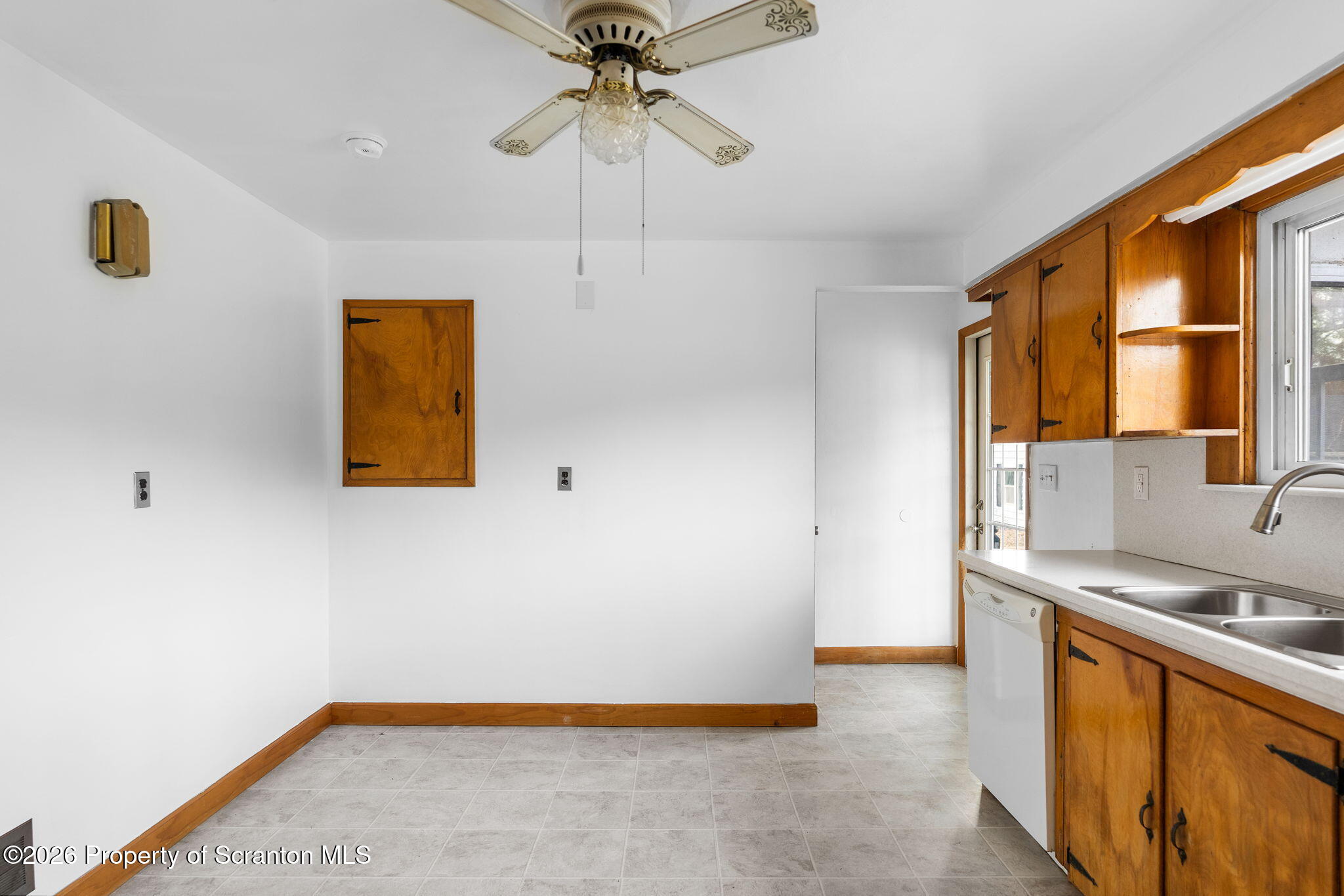 139 N Road Windsor, NY 13865 - Photo 22 of 44 a view of a kitchen with a sink and dishwasher