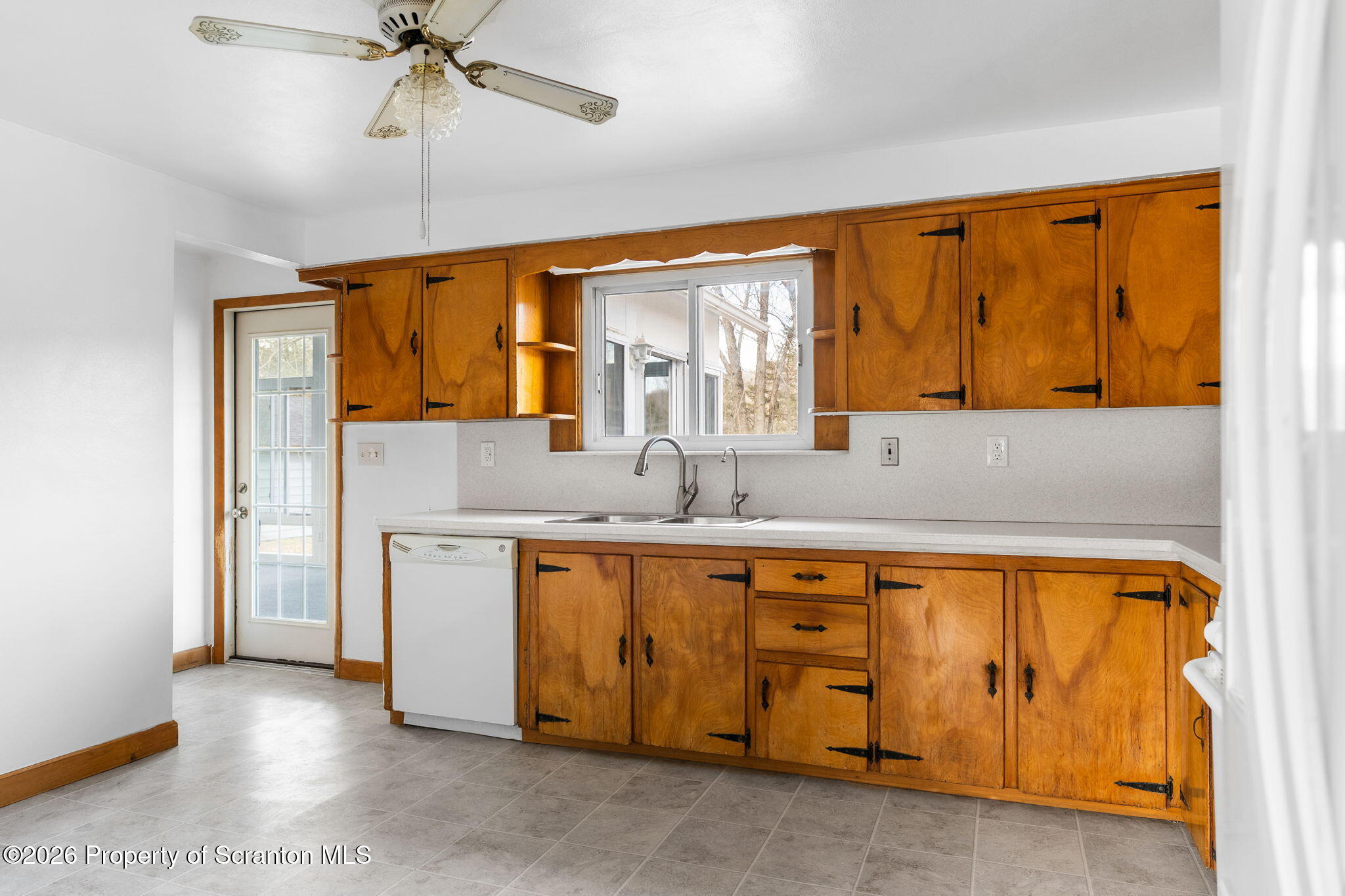 139 N Road Windsor, NY 13865 - Photo 24 of 44 a kitchen with stainless steel appliances granite countertop a sink and a cabinets