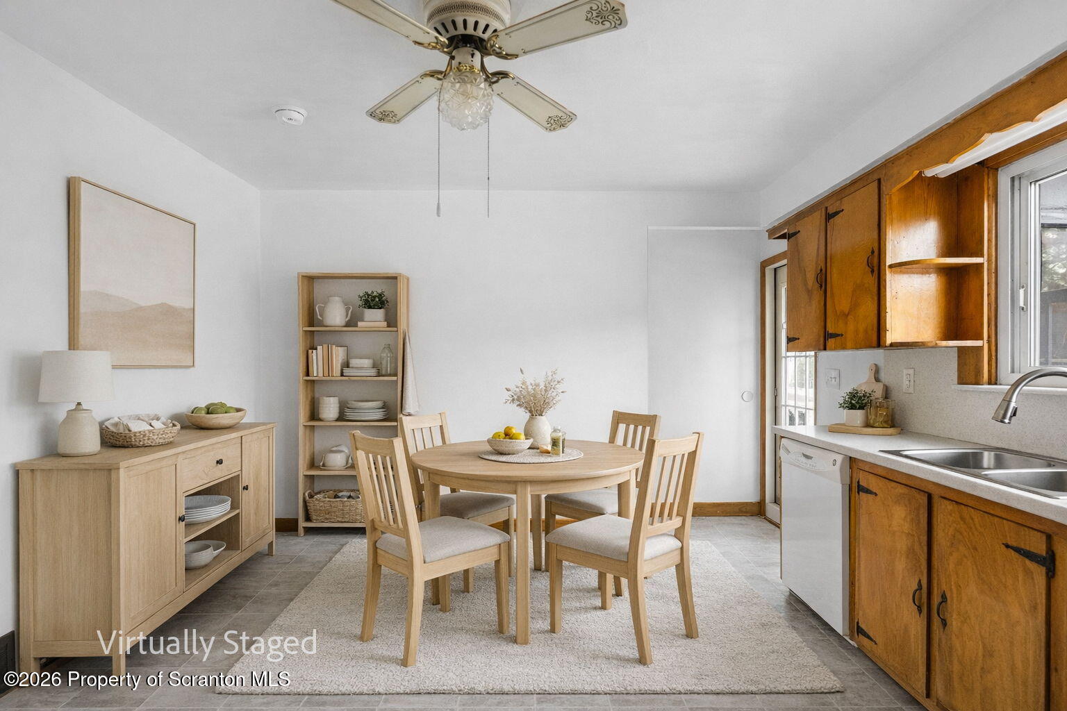 139 N Road Windsor, NY 13865 - Photo 25 of 44 a view of a dining room with furniture and a chandelier fan