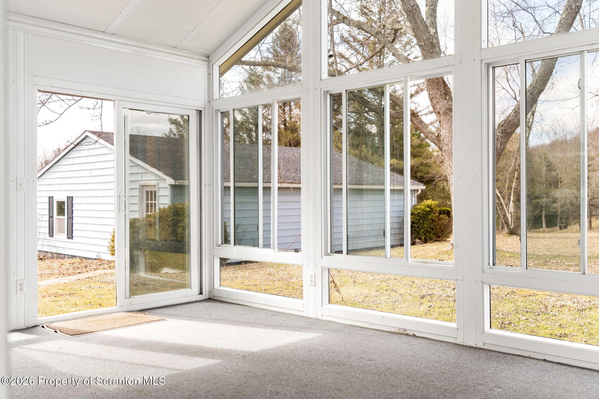139 N Road Windsor, NY 13865 - Photo 27 of 44 a view of a large window with an outdoor space