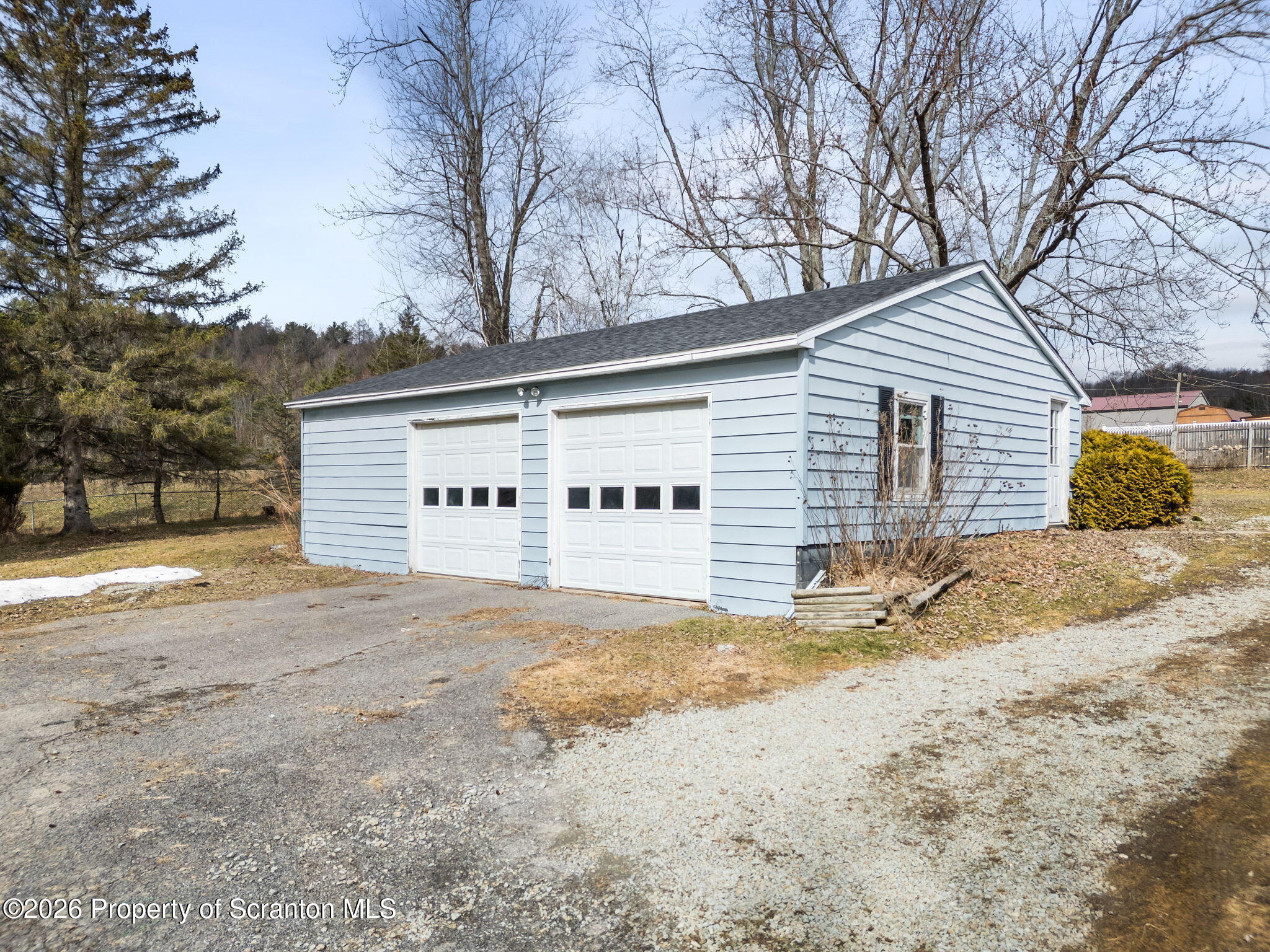 139 N Road Windsor, NY 13865 - Photo 35 of 44 a view of a house with a snow in the yard