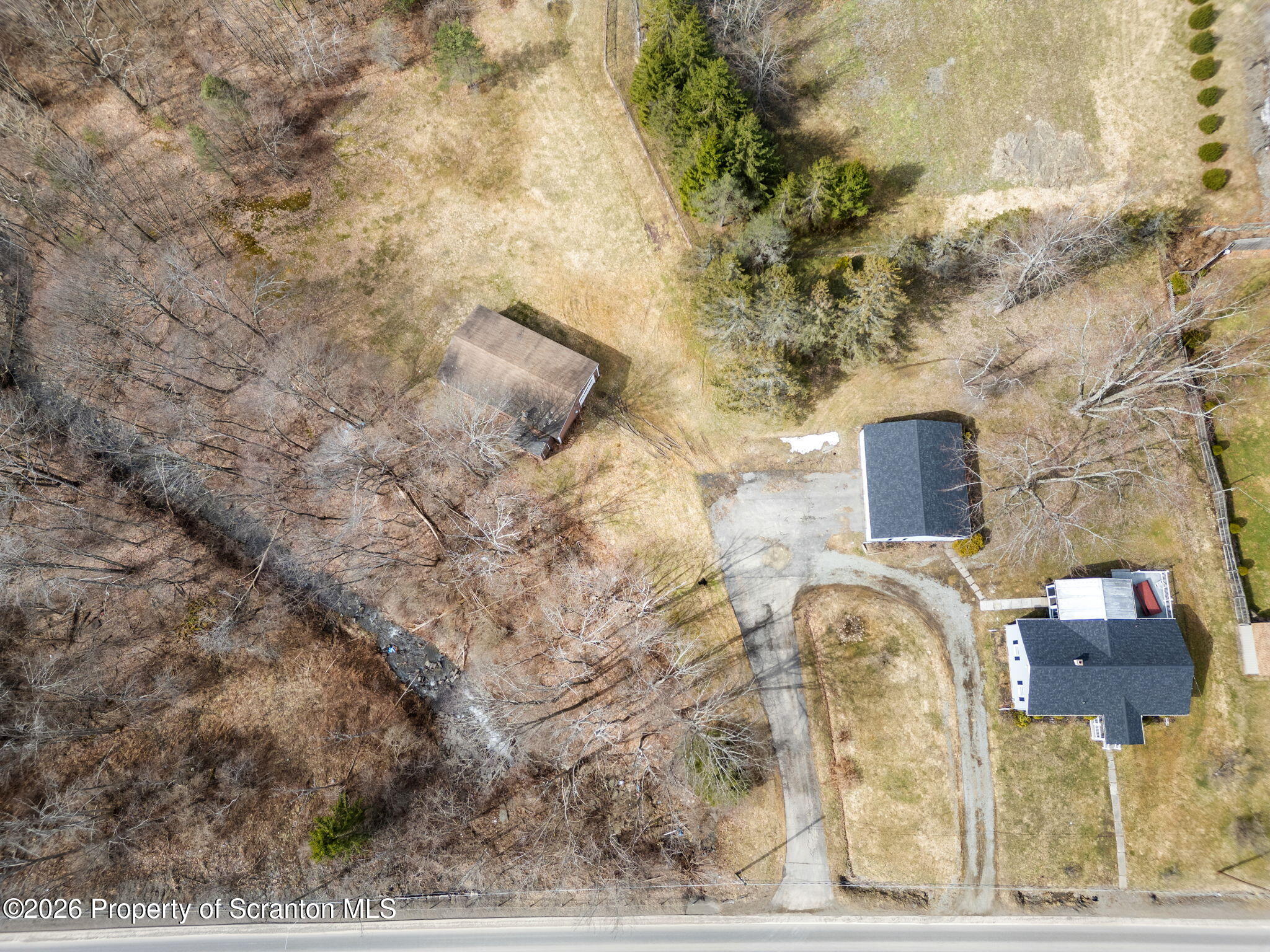 139 N Road Windsor, NY 13865 - Photo 37 of 44 a backyard of a house with a yard