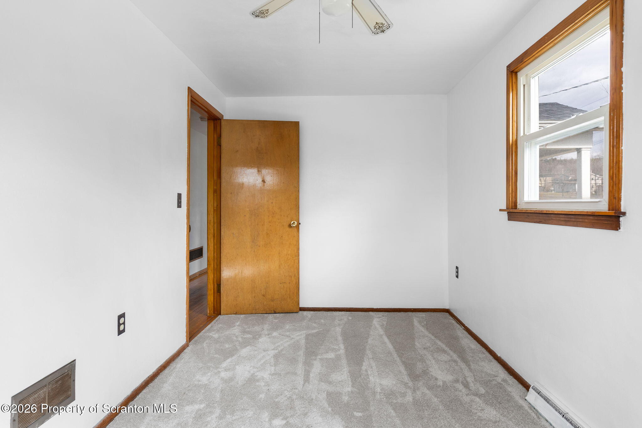139 N Road Windsor, NY 13865 - Photo 10 of 44 a view of an empty room with a window