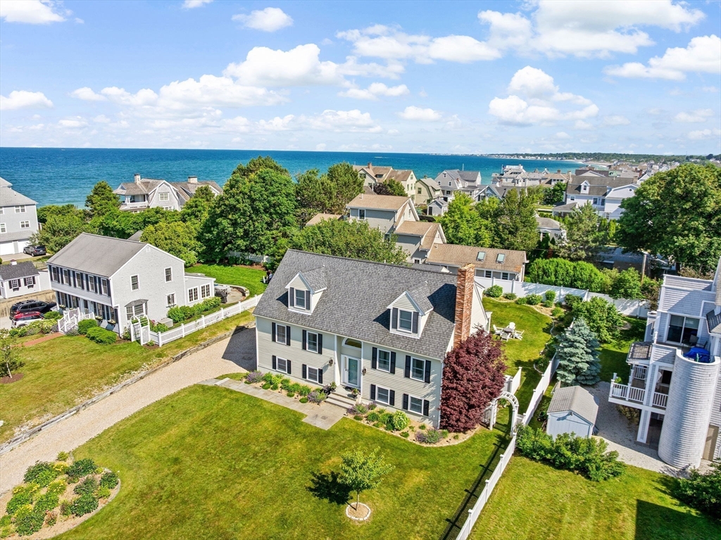 5 Cliff Estates Road Scituate, MA 02066 - Photo 1 of 42 an aerial view of a house with a garden and lake view