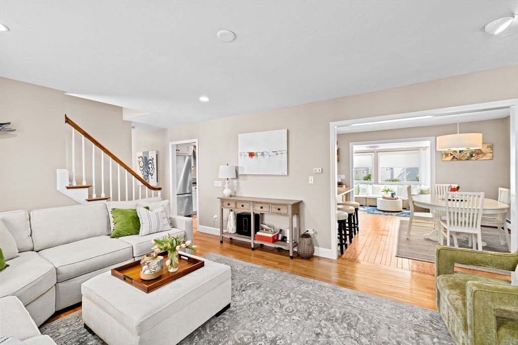 5 Cliff Estates Road Scituate, MA 02066 - Photo 11 of 42 a living room with furniture and a fireplace