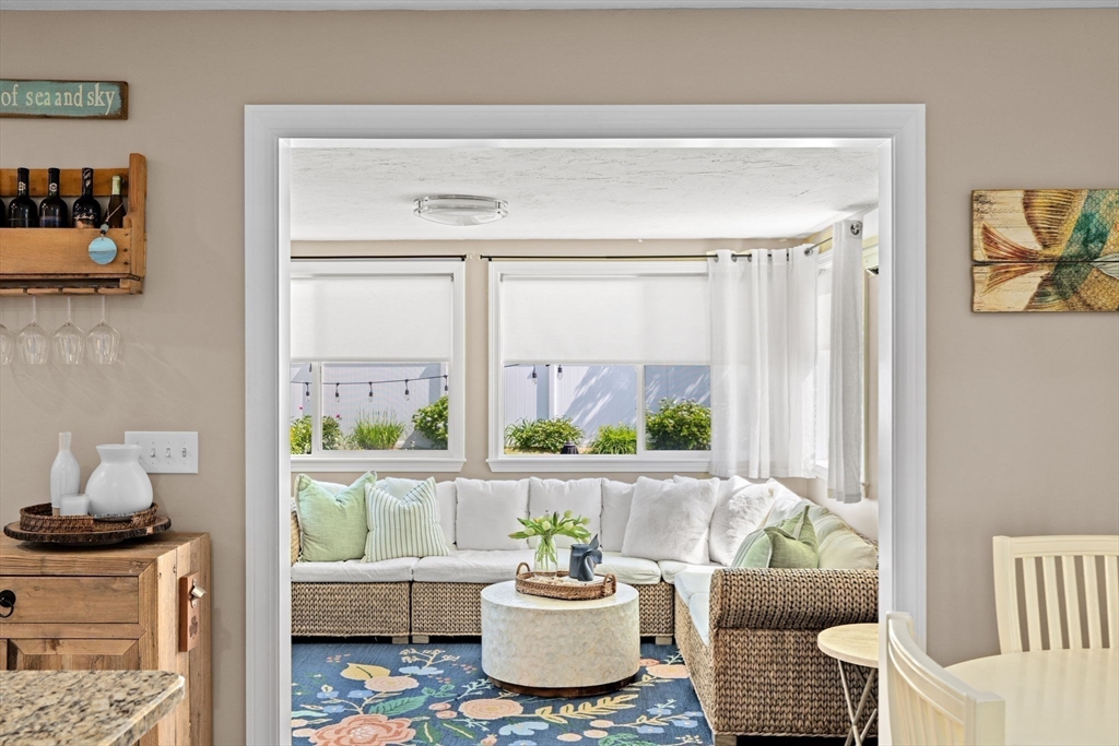 5 Cliff Estates Road Scituate, MA 02066 - Photo 14 of 42 a living room with furniture and a window