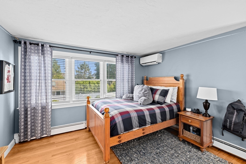 5 Cliff Estates Road Scituate, MA 02066 - Photo 27 of 42 a bedroom with bed and a window