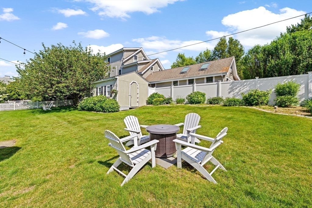 5 Cliff Estates Road Scituate, MA 02066 - Photo 38 of 42 a view of a chairs and table in the garden