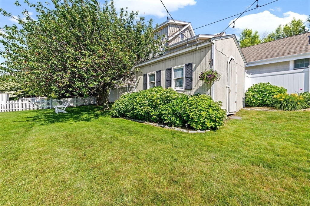 5 Cliff Estates Road Scituate, MA 02066 - Photo 40 of 42 a view of a house with backyard and garden
