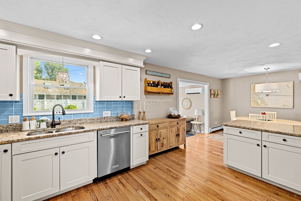 5 Cliff Estates Road Scituate, MA 02066 - Photo 8 of 42 a kitchen with a sink stove and cabinets