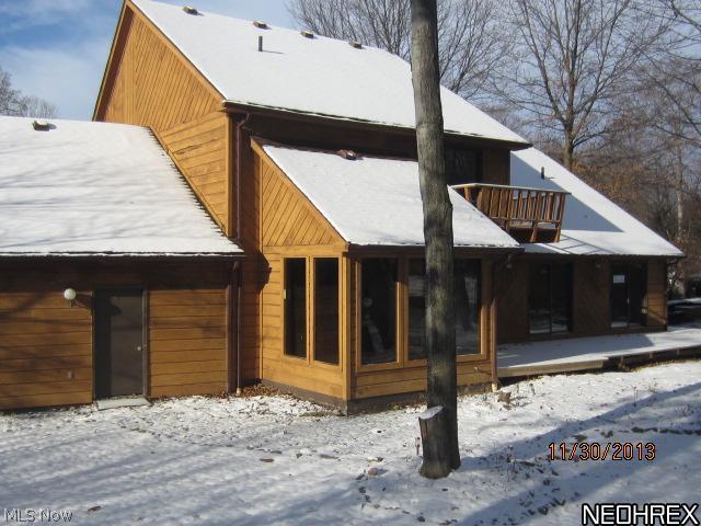 1185 Woodbend Road Ravenna, OH 44266 - Photo 4 of 22 Back 2 showing balcony and deck