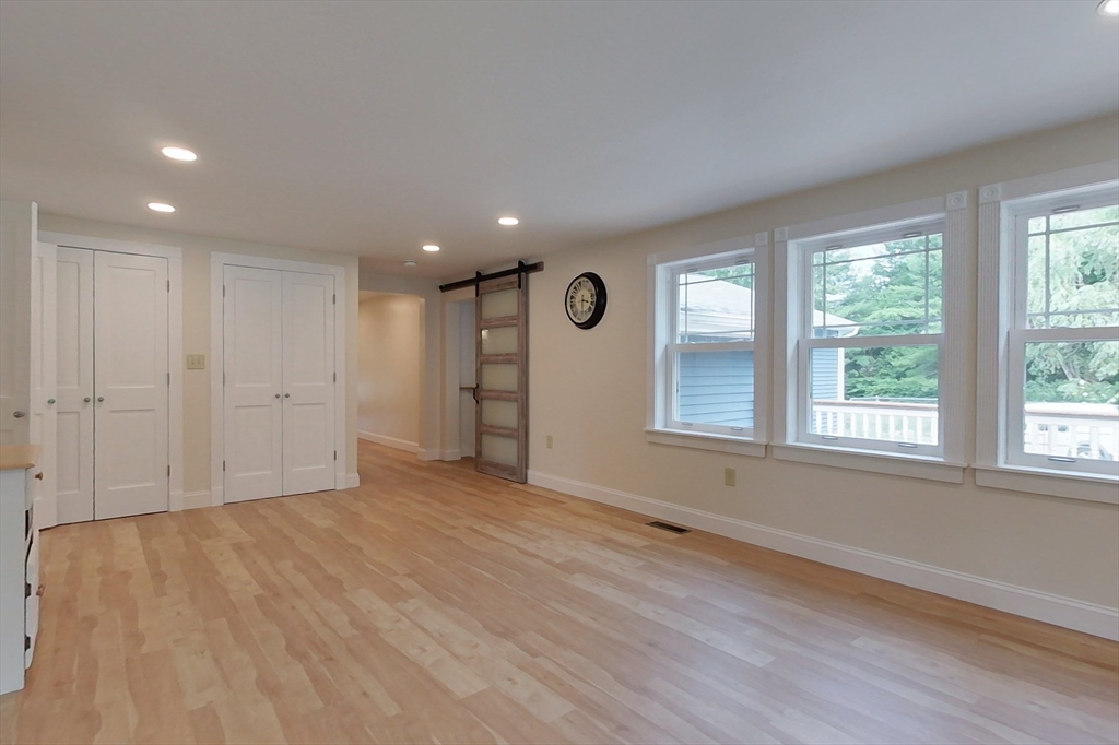 103 Lowell Road Pepperell, MA 01463 - Photo 19 of 42 a view of an empty room with a window
