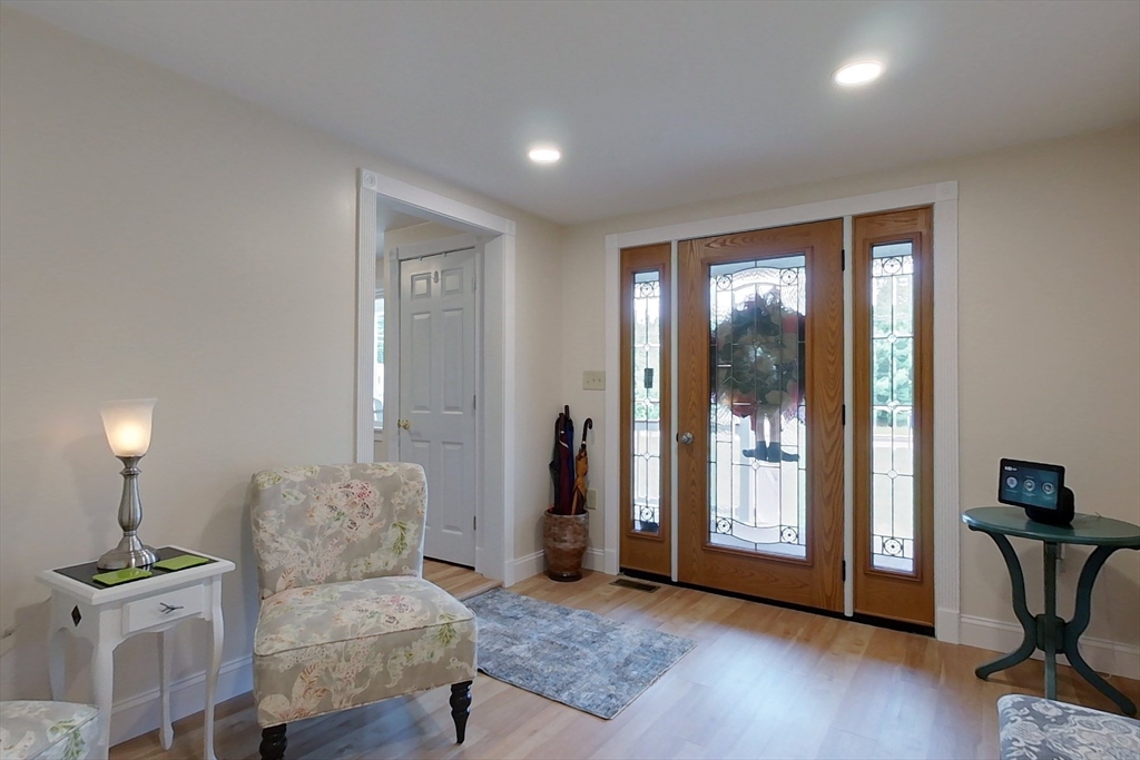 103 Lowell Road Pepperell, MA 01463 - Photo 28 of 42 a living room with furniture and a window