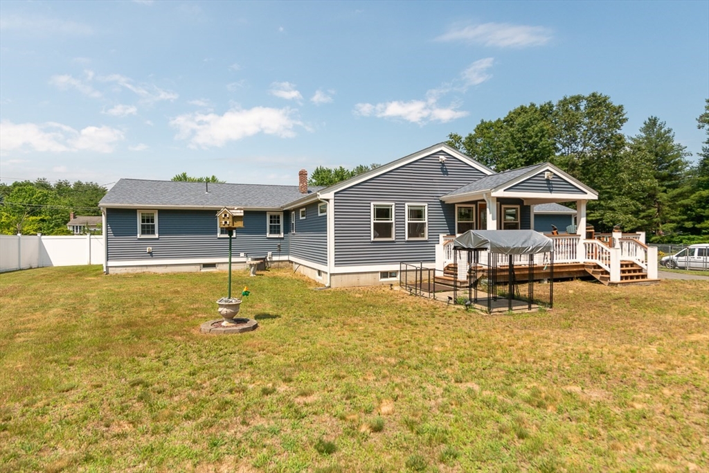 103 Lowell Road Pepperell, MA 01463 - Photo 35 of 42 a front view of a house with swimming pool