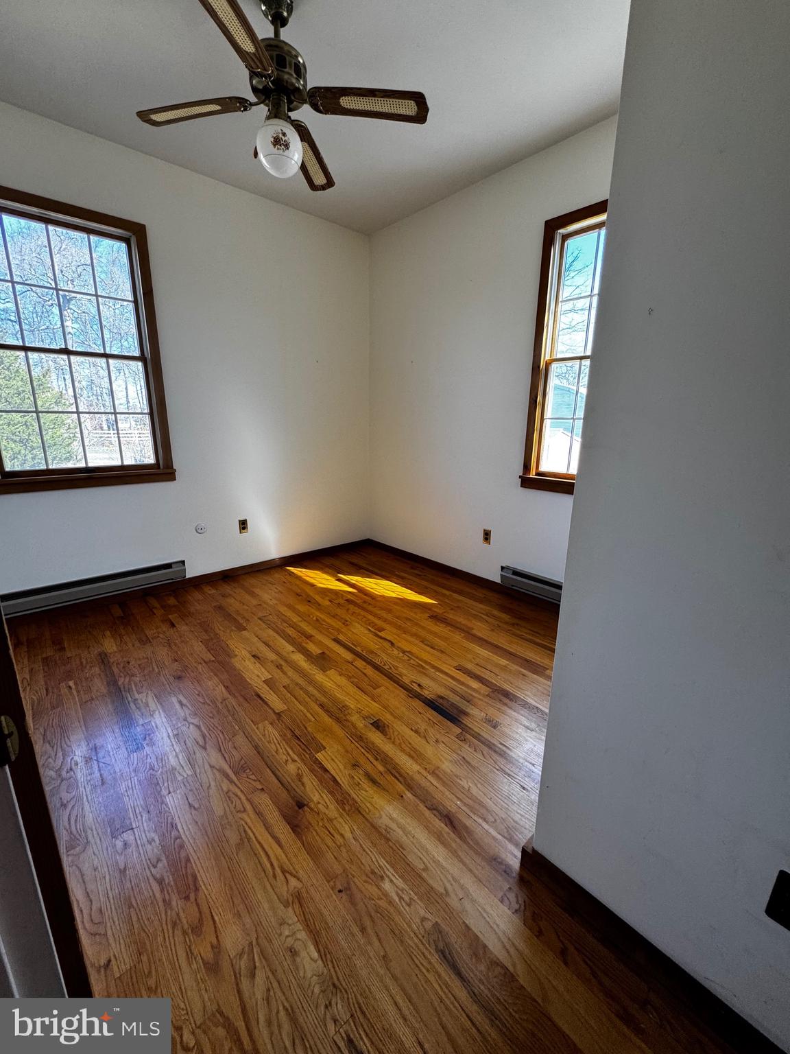 18 Province Line Road New Egypt, NJ 08533 - Photo 6 of 15 wooden floor in an empty room with a window