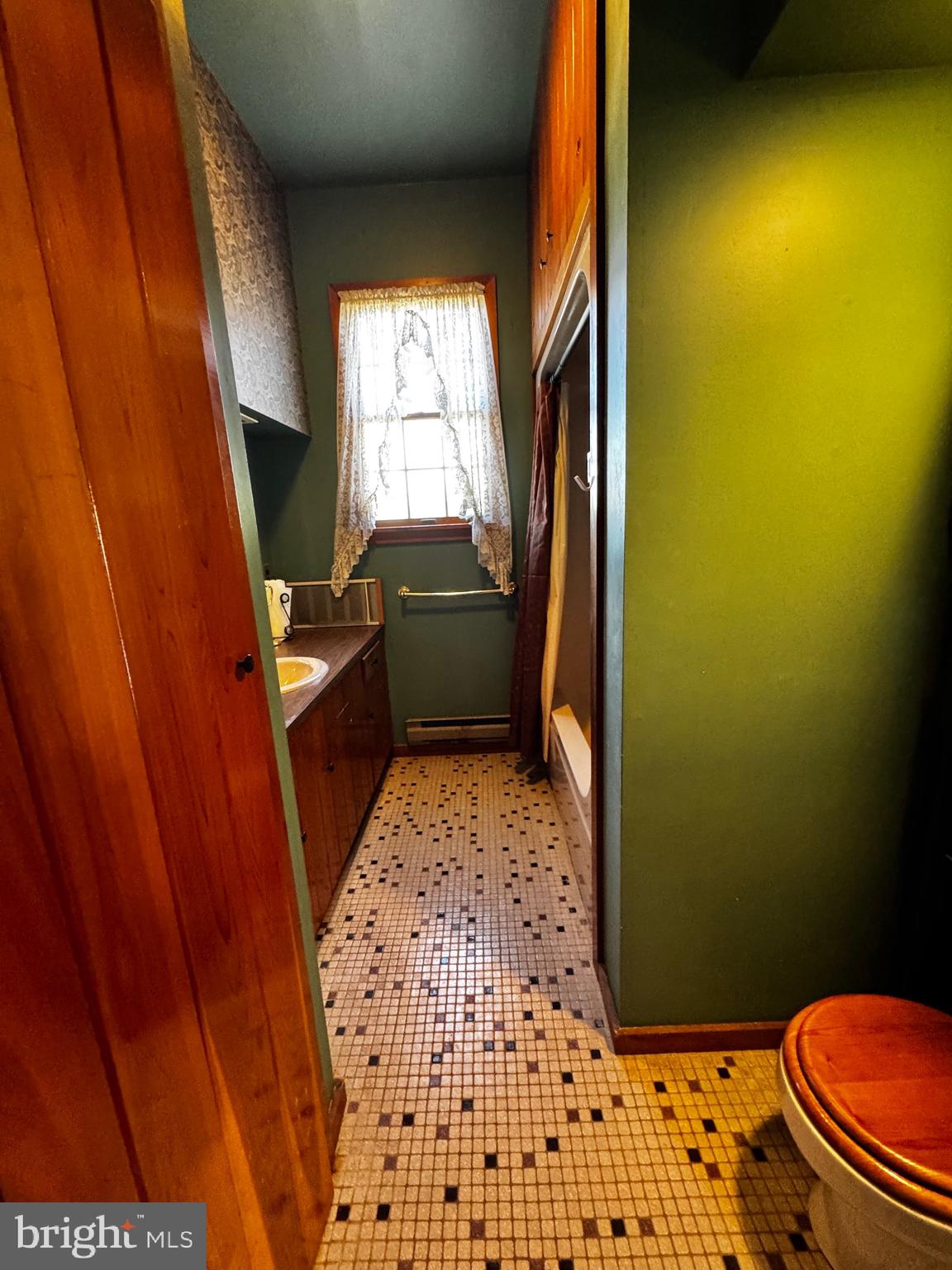 18 Province Line Road New Egypt, NJ 08533 - Photo 7 of 15 a bathroom with a sink toilet and window