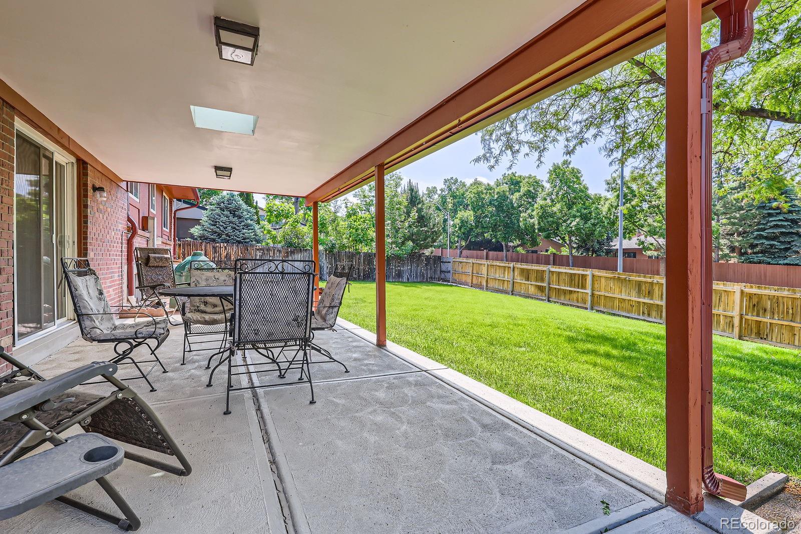 7464 East Colgate Place Denver, CO 80231 - Photo 4 of 7 a view of yard with patio