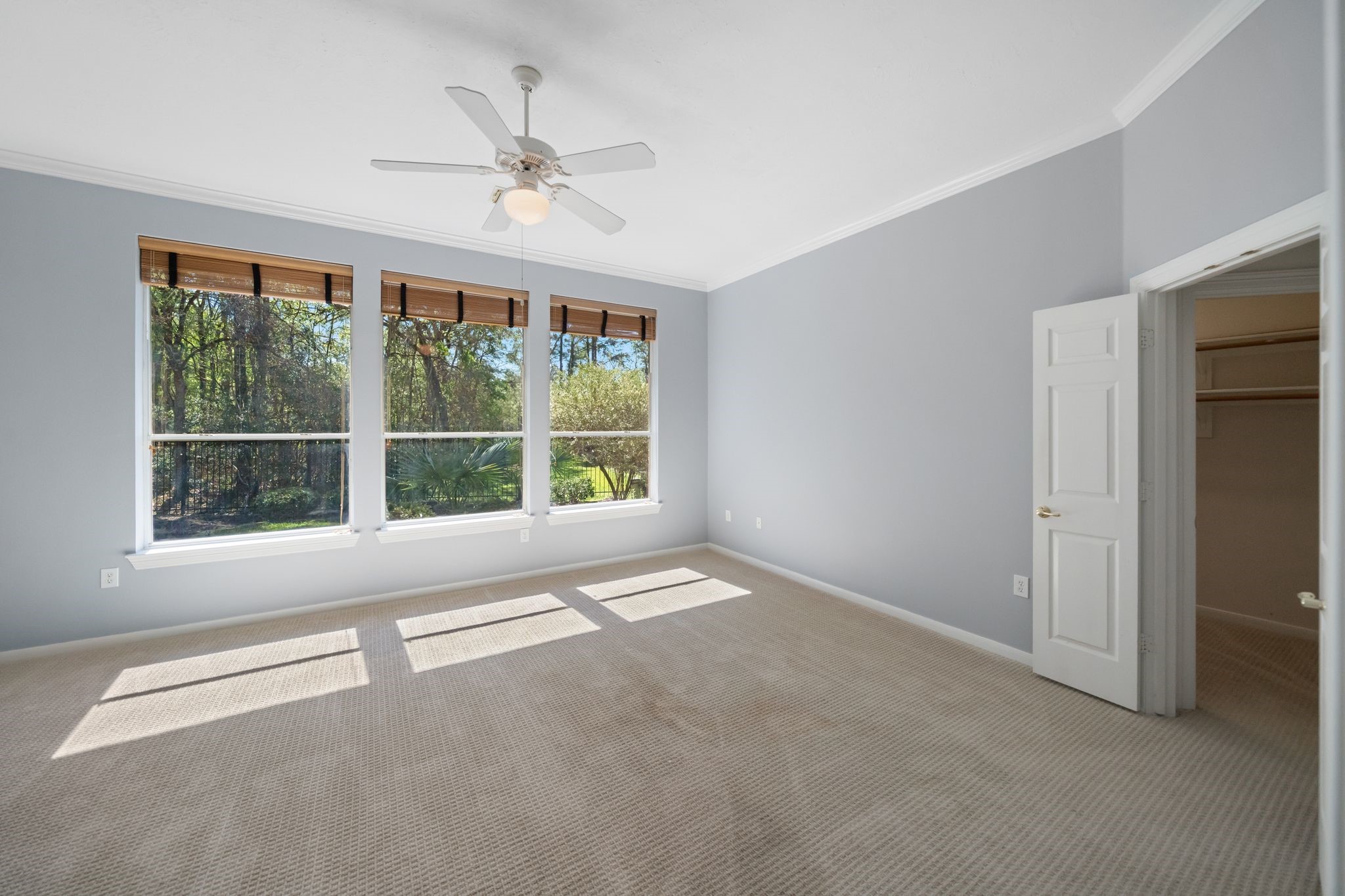 7 Sovereign Way Conroe, TX 77384 - Photo 11 of 31 a view of an empty room with a window