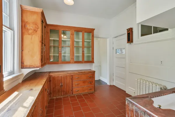 a spacious bathroom with a tub and shower