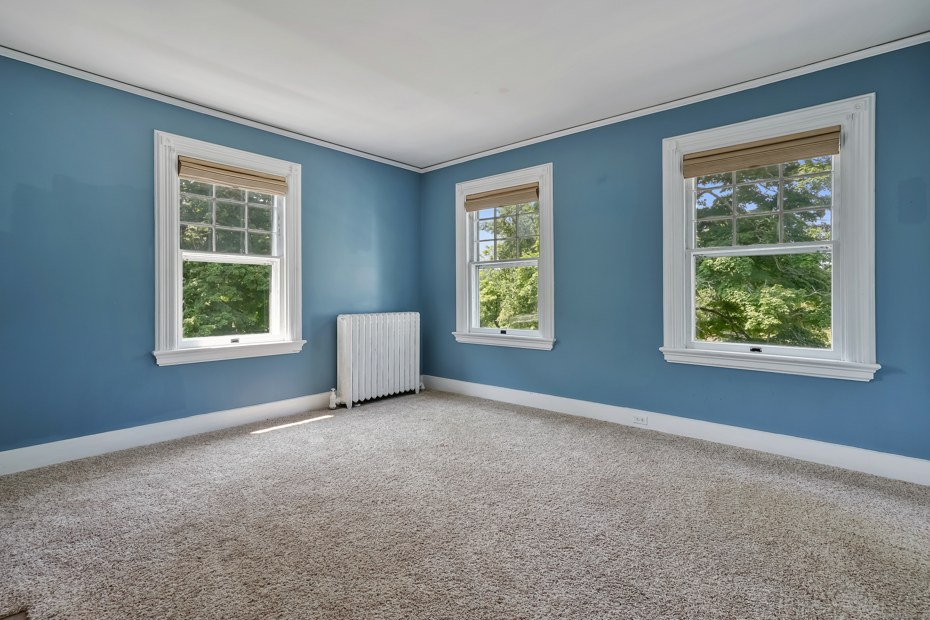 56 East Ridge Road Ridgefield, CT 06877 - Photo 21 of 38 an empty room with windows