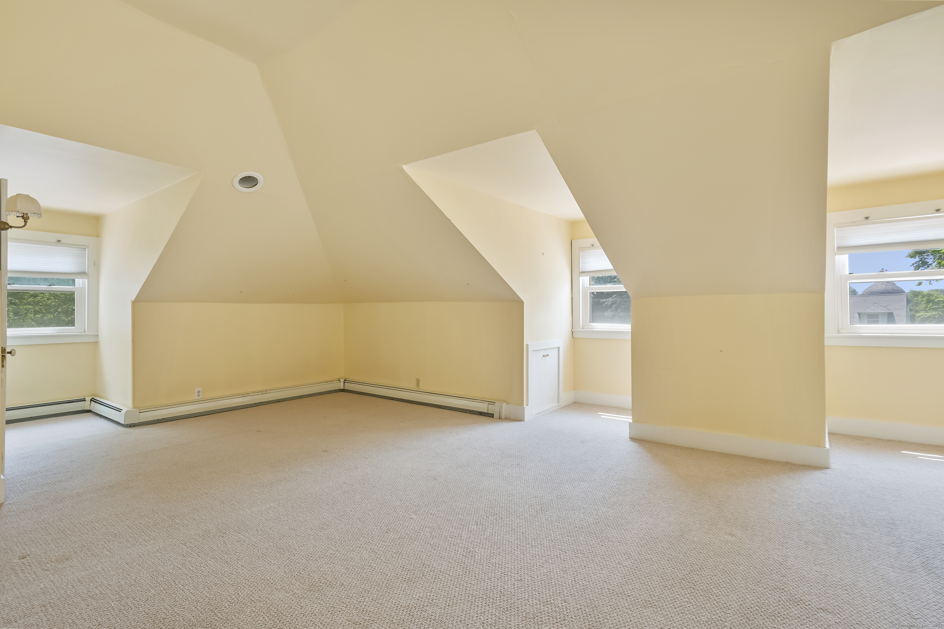 56 East Ridge Road Ridgefield, CT 06877 - Photo 28 of 38 a view of an empty room with a window