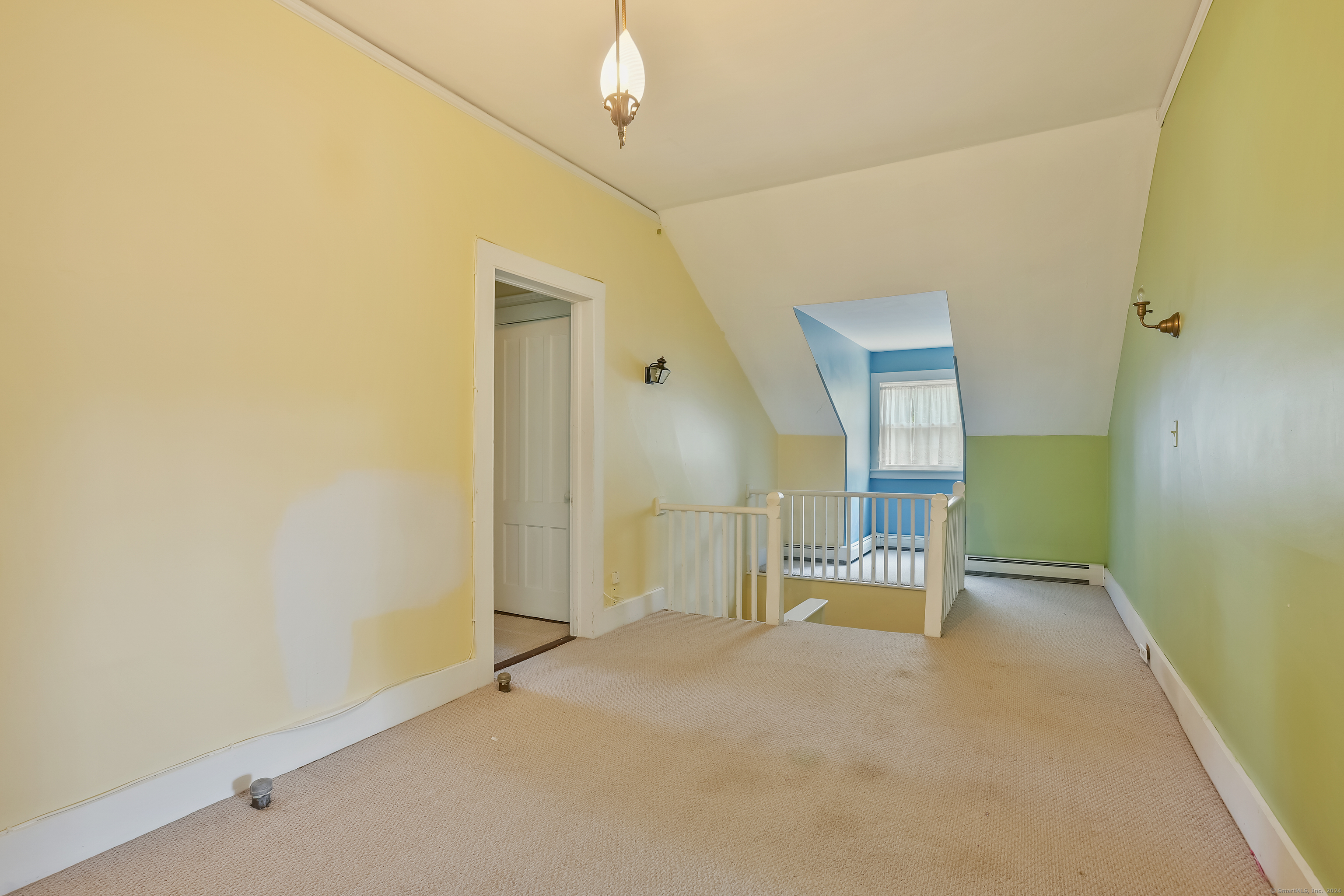 56 East Ridge Road Ridgefield, CT 06877 - Photo 29 of 38 an empty room with a mirror and a sink