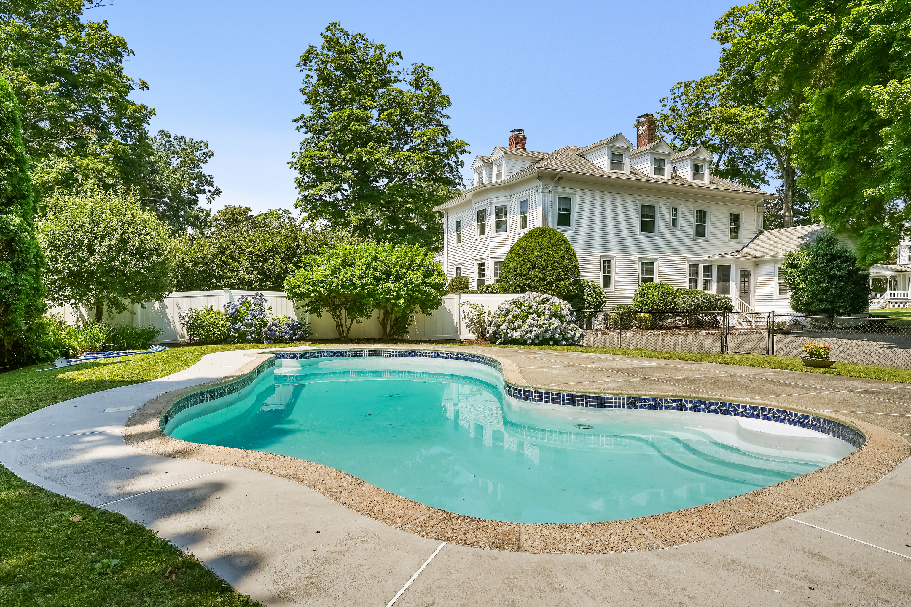 56 East Ridge Road Ridgefield, CT 06877 - Photo 3 of 38 a view of outdoor space yard swimming pool and patio