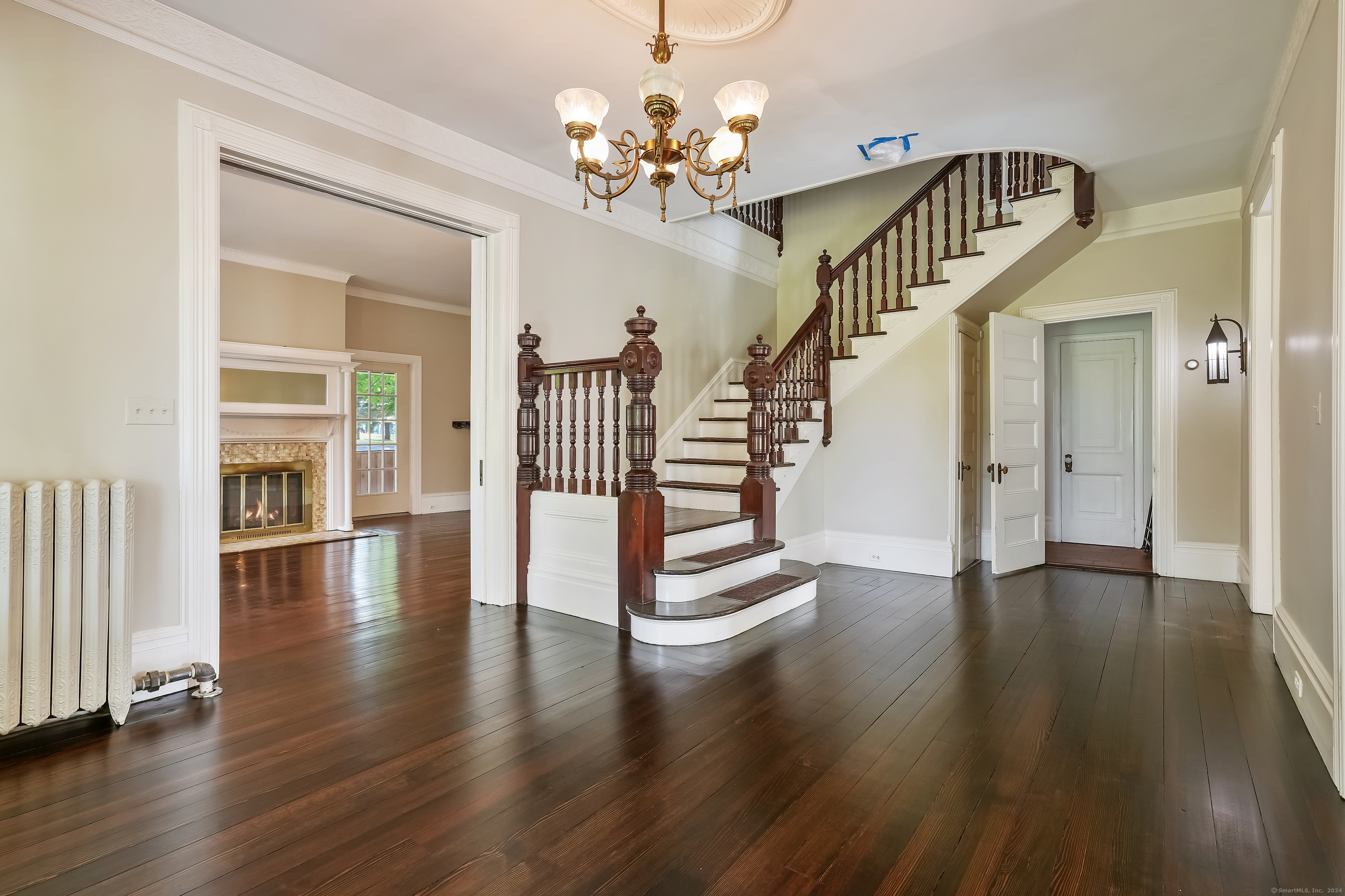 56 East Ridge Road Ridgefield, CT 06877 - Photo 6 of 38 a view of entryway and hall with wooden floor