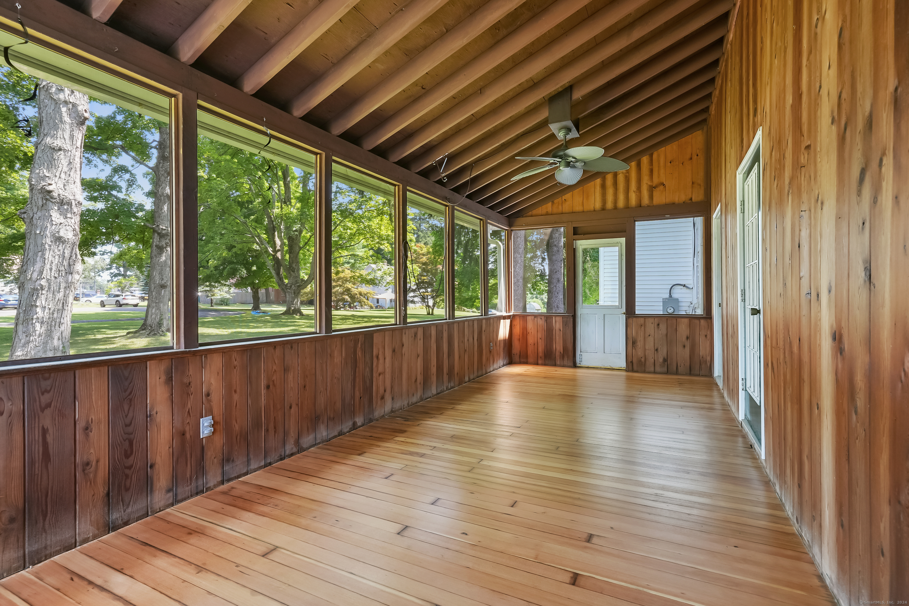 56 East Ridge Road Ridgefield, CT 06877 - Photo 8 of 38 a view of interior space with wooden floor and outdoor space
