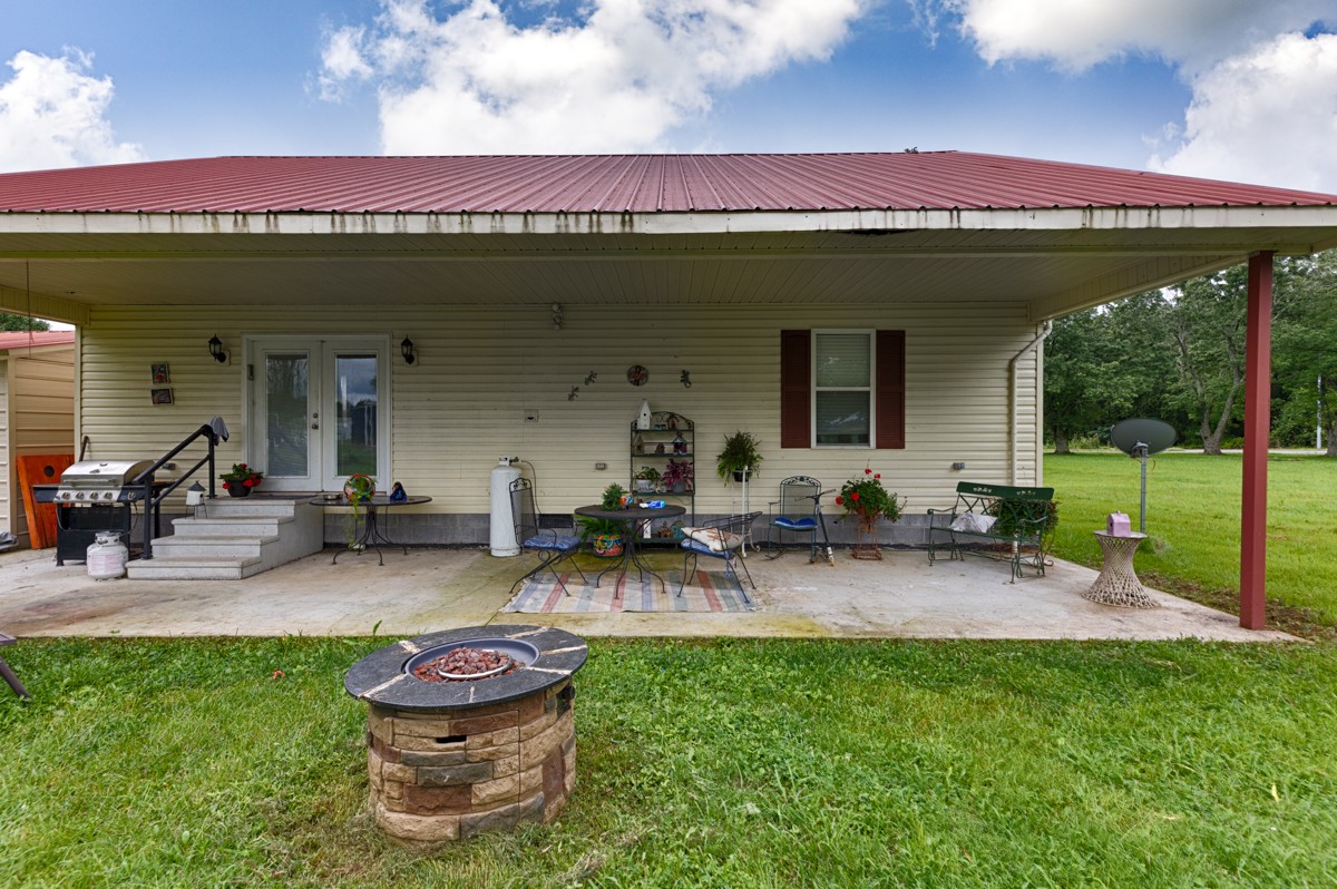 113 Elliot Road Ardmore, TN 38449 - Photo 20 of 25 a front view of house with outdoor seating