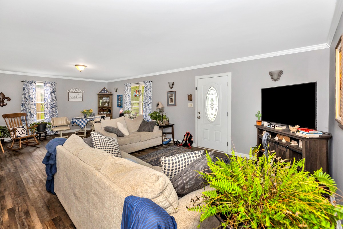 113 Elliot Road Ardmore, TN 38449 - Photo 3 of 25 a living room with furniture and a flat screen tv