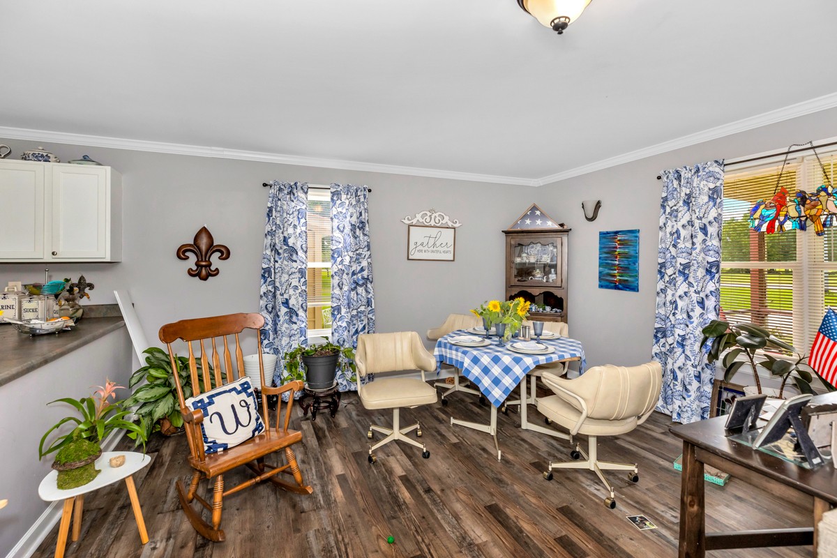 113 Elliot Road Ardmore, TN 38449 - Photo 6 of 25 a living room with furniture and wooden floor