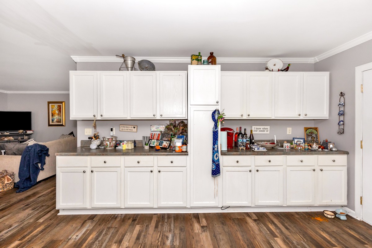 113 Elliot Road Ardmore, TN 38449 - Photo 9 of 25 a kitchen with stainless steel appliances a sink and cabinets