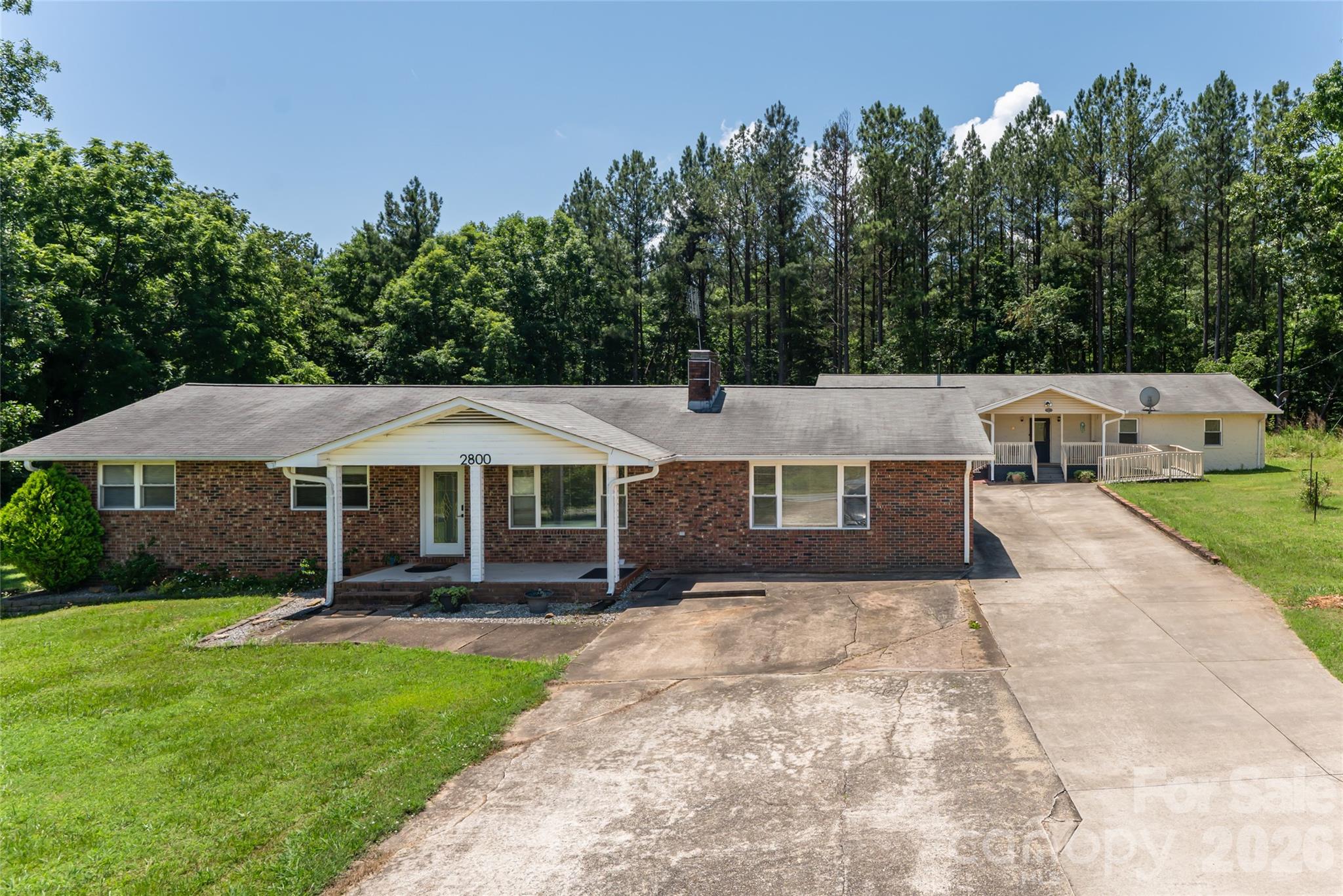 2800 Coxe Road Tryon, NC 28782 - Photo 2 of 40 a view of a house with a yard