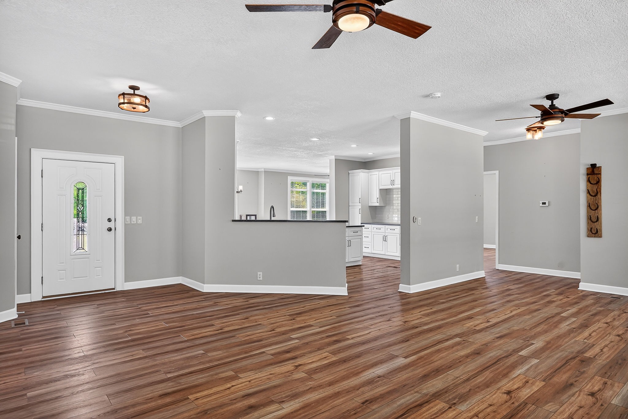 16062 Buffalo Valley Road Silver Point, TN 38582 - Photo 6 of 27 a view of an empty room with wooden floor